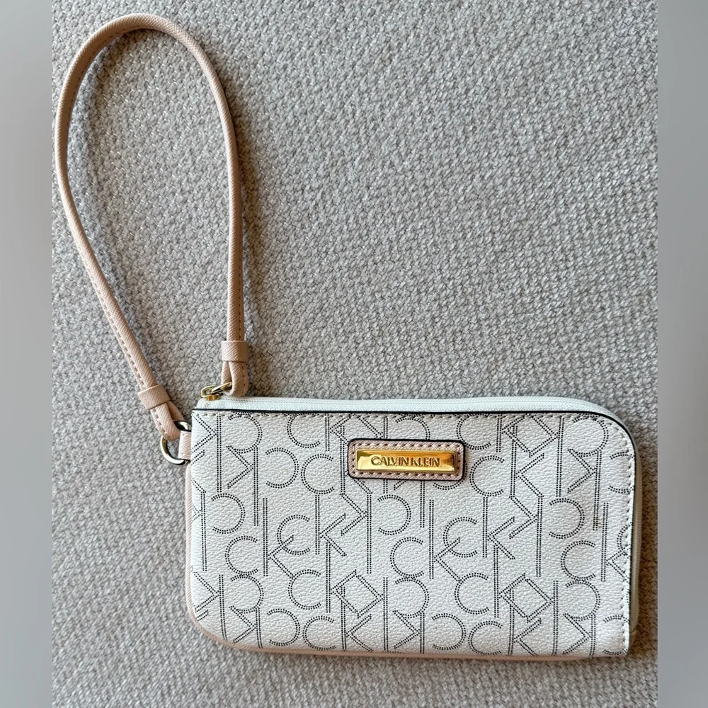 Calvin Klein Signature Pattern Wristlet in Cream and Tan